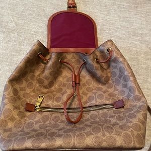 Evie Backpack In Signature Canvas with matching wallet